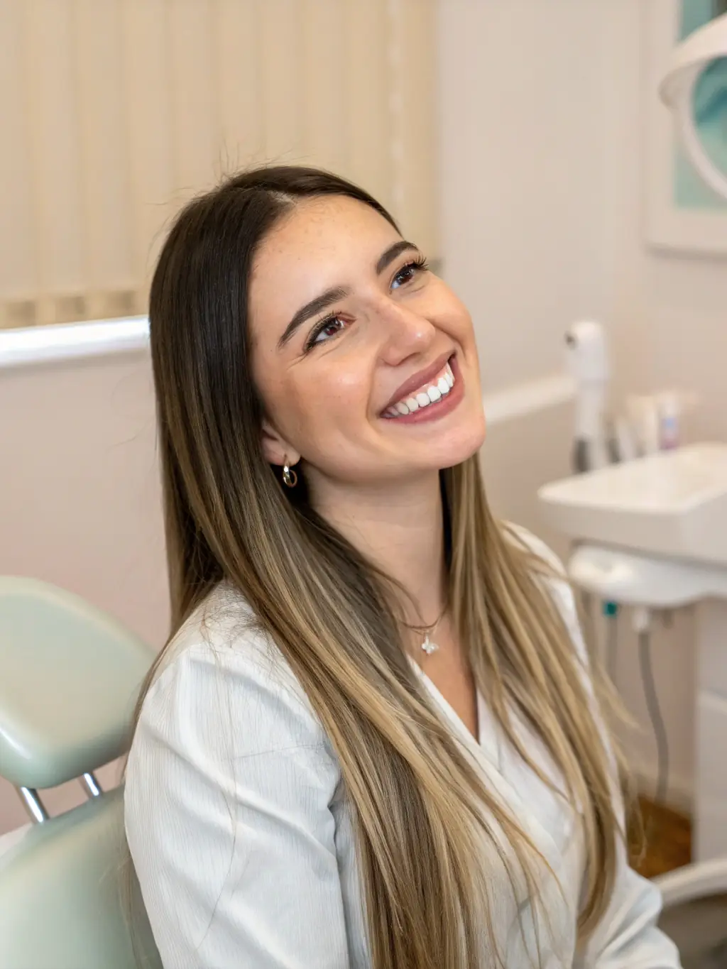 A person laughing freely with a radiant, white smile, emphasizing the joy and self-assurance gained from using Luminous Teeth Whitener.